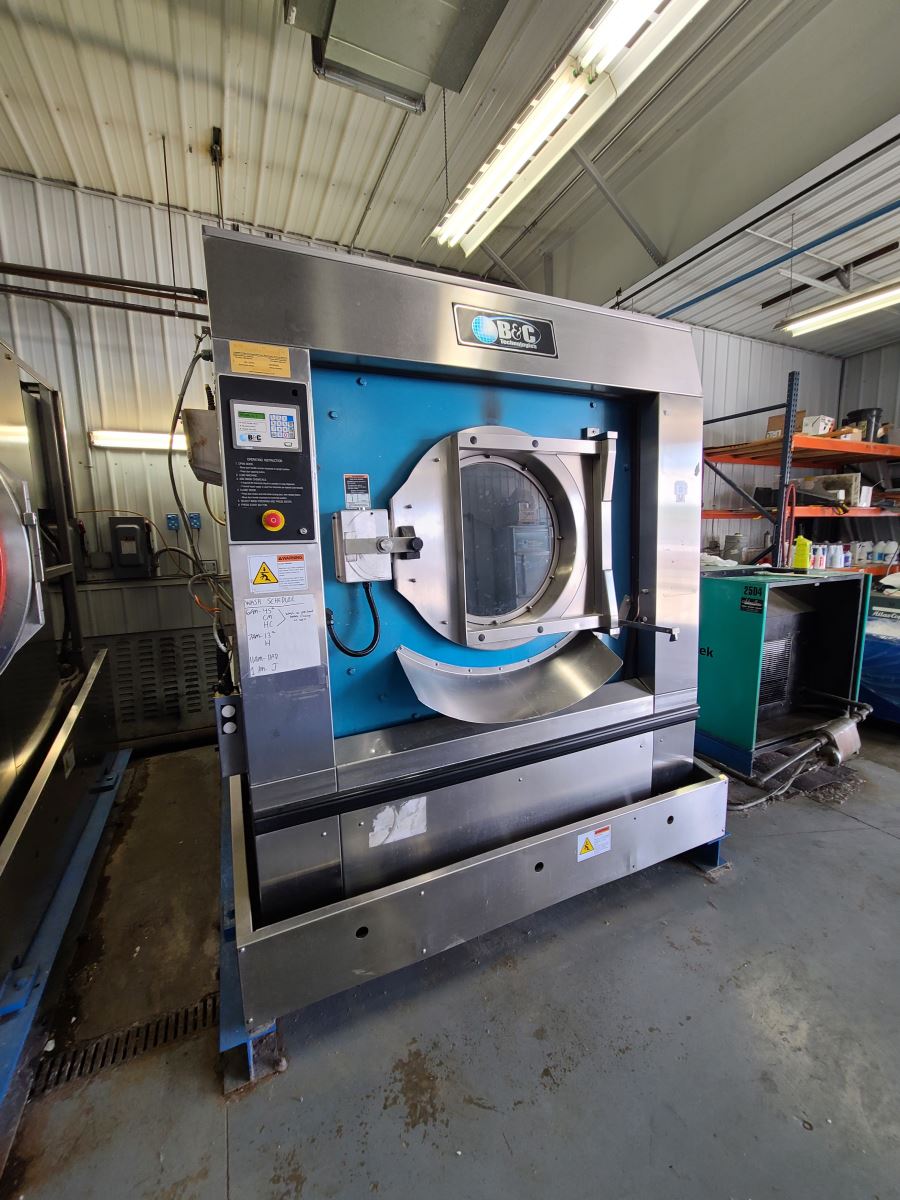 How a Used Washer Extractor Can Enhance Laundry Operations